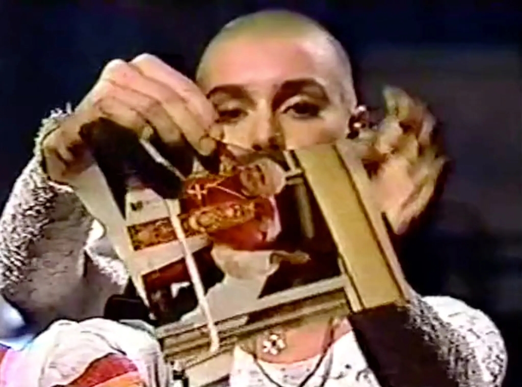Sinead O'Connor on Saturday Night Live, 1992, tearing a photo of Pope John Paul II.